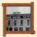 Roma Hotel, Fernie. Circa 1918. &quot;[My father Cosmo] got into the hotel business. He ran the Roma Hotel - or he was bartender - I don't know what the distinctions were. ... It's the Fernie now. They used to serve hard liquor in those days - and of course, beer. The sign says: 'Rooms a dollar and up' - so when they say 'up' it probably meant to a dollar and a quarter. I don't even know if they served meals there. They had the card room and that kind of thing. You know we had the Italian Band in those days eh? My Dad was in that, he played the drums.&quot;