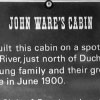 Sign telling visitors about John Ware's cabin