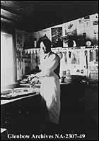 Mow, Chinese man working in ranch kitchen as a cook, ca. 1905-1906.