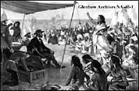 The Blackfoot Treaty (Treaty 7), 1877, Crowfoot speaking. Painting by A. Bruce Stapleton. Original owned by J. B. Cross. At left standing is Major Irvine; next to him in buckskin is interpreter Jean L'Heureux. Seated is Colonel Macleod and Lieutenant Governor Laird, in civilian dress. At right is Crowfoot, with interpreter beside him. 