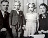 Rudy and Jean Kotkas with their two children, Ken and Loreen, pose for a family photo, 1936.