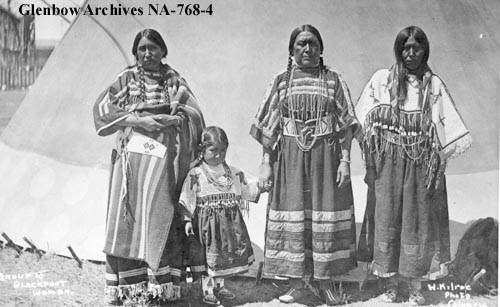 Blackfoot Women in front of tipi