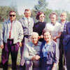 Robert Kreem and Helene Johani  visited Alberta in June 1965 to collect historical material about Alberta\'s Estonian community  and Alberta\'s Estonian pioneers.  Robert Kreem is standing on the far right, Mrs. Johani is kneeling in front.
