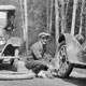 Attilio Caffaro changing tire.  Canmore, Alberta, 1923.  Note rack for spare wheel at rear of 1919 Buick.  Photo courtesy of Glenbow Archives.