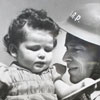 Photo of soldier with baby.