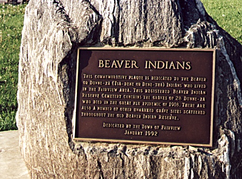 Cairn at the mass grave. Plaque reads: This commemorative plaque is dedicated to the Beaver or Dunne-Za (Tsa-Dene or Dene-Tha) Indians who lived in the Fairview area. This registered Beaver Indian Reserve Cemetary contains the graves of 28 Dunne-Za who died in the great flu epidemic of 1918. There are also a number of other unmarked grave sites scattered throughout the old Beaver Indian Reserve. Dedicated by the town of Fairview January, 1992.