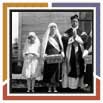 Pre Charles Chalifoux et Enfants de Marie avec paniers de pain bnit
