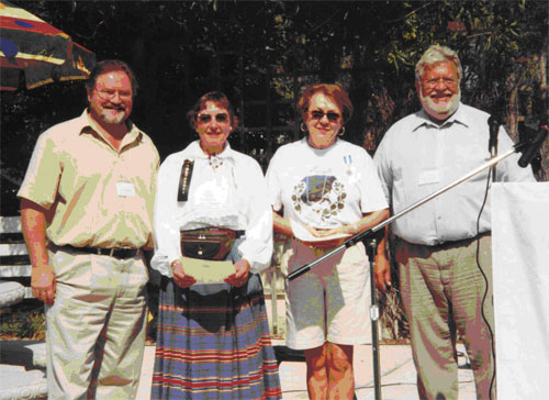 Avo Kittask, left, President of the Estonian Council in Canada, and Laas Leivat, right, Honourary Head Consul for Estonia in Canada, presented Helgi Leesment, centre left, and Eda McClung, centre right, with the \\\'Canadian-Estonian Award of Merit\\\'.