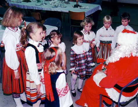 Estonian supplementary school children getting acquainted with Santa Claus (Juluvana) in Calgary, 1988