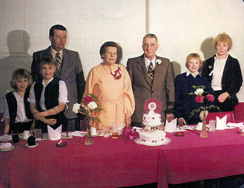 Celebrating Herman and Marie Kalev's 40th wedding anniversary, ca 1980.
From left to right:Myrna, Lori and Walter Kalev, Marie and Herman Koppel, and Brian and Tiiu (Koppel) Kalev.