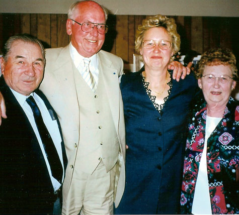 left to right: Otto Nicklom, President Lennart Meri, Mrs. Helle Meri, and Gladys Nicklom in Linda Hall, 2000.