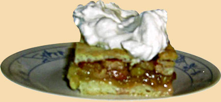 Pictured is a dessert pirukas, with a topping of whipped cream,based on a recipe by Annie Raho, an original member of the Linda Ladies Group. The recipe is derived from the Linda Hall Ladies Cookbook and also published in 2009 Summer issue of AjaKaja