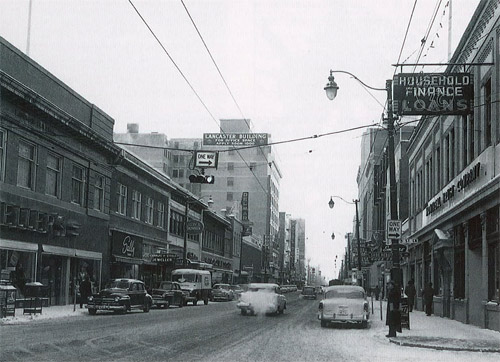 This is how Calgary looked when Grant MacEwan arrived in the early 1950s. It is a view of Eighth Avenue, looking east from Third Street West.