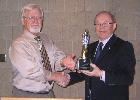 Dave Kiil receives Award of Recognition from Bob Kingsep, President of the Alberta Estonian Heritage Society in recognition of his contribution to the production of \"Alberta\'s Estonians\" DVD, Red Deer, 2008