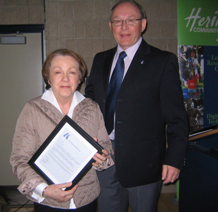 Eda McClung receives a Letter of Appreciation from Bob Kingsep, President of Alberta Estonian Heritage Society in recognition of her  commitment to the Society, Red Deer, 2008