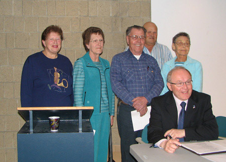 The 2009 Planning Committe is pictured at the AGM in Red Deer, 2006. L to R: Evelyn Shursen, Irene Kerbes, Deane Kerbes, Roy Klaus,Astrid Ustina. Seated is Bob Kingsep, President, AEHS