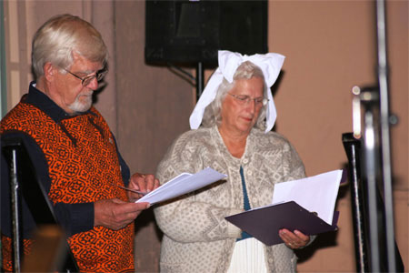 Dave Kiil as Jri and Martha Munz Gue as Mari during the presentation of a Reader\'s Theatre play, written by Lillian Munz,  about a pioneer family who settled in Barons, Alberta.