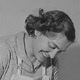 Mrs. E. Andrenacci mixing eggs and flour for macaroni for tagliatelli, a popular Italian dish.  Photo courtesy of Glenbow Archives. 