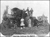 Threshing crew, Wainwright area, August 1908, note the water wagon on the right.