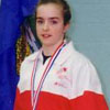 Milvi Tiislar wins  gold medal in tumblingat the 1995 Alberta Winter Games.