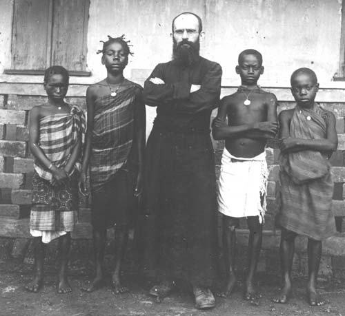 A missionary with natives