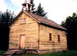 The restored St. Charles Mission Church at Dunvegan.