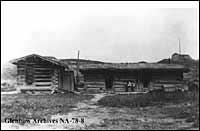 Homesite of Old Mexico (AL) Ranch, Steveville, Alberta. At left the "Blue Room" containing solid walnut bedstead, bureau and washstand. At right the "Bull Room" furnished with long table and wooden benches and homemade willow chairs.