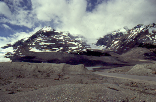 Columbia Icefield. The road to the parking lot at the toe of the Athabasca Glacier cuts through a series of recessional moraines, created when the glacier's retreat stalled for a time.