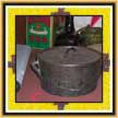 Pot used to boil water in front of some other common fur trade items