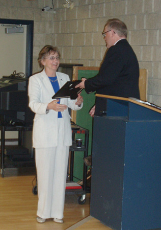 Helgi Leesment receives a Letter of Appreciation from Bob Kingsep, President of the Alberta Estonian Heritage Society in recognition of her contributions to the Society, Red Deer, 2008