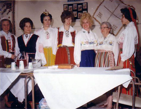 Calgary Estonian display featured seven Estonian women dressed in colorful national dress, 1960 